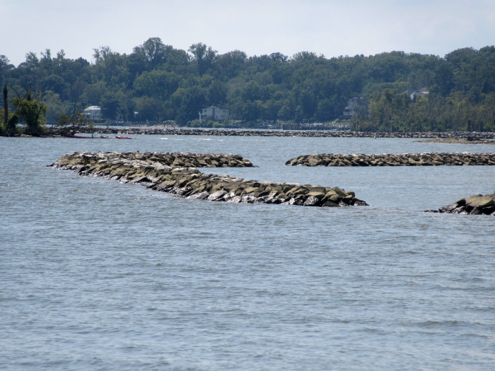 [Photo]  Sills are separated by openings for fish and wildlife movement